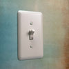Devon Light Almond Steel - 4 Toggle Wallplate